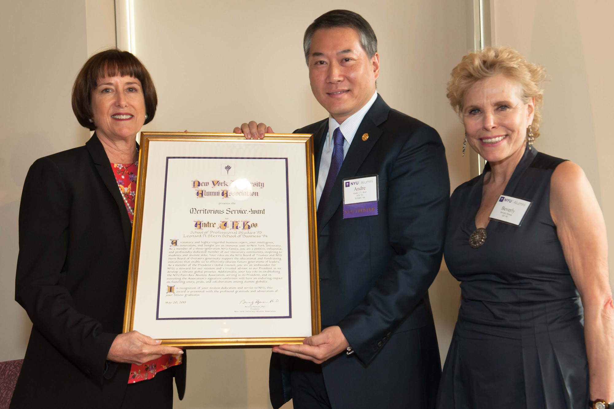 Andre J.L. Koo (SPS ’93, STERN ’94) accepting award