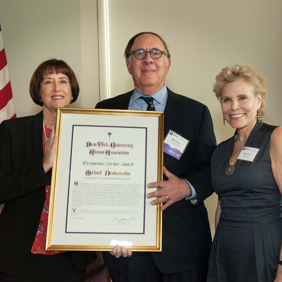Michael P. Denkensohn (STERN ’73) accepting award