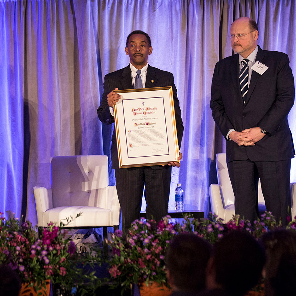 Jonathan Woodson (GSM '79) accepting award