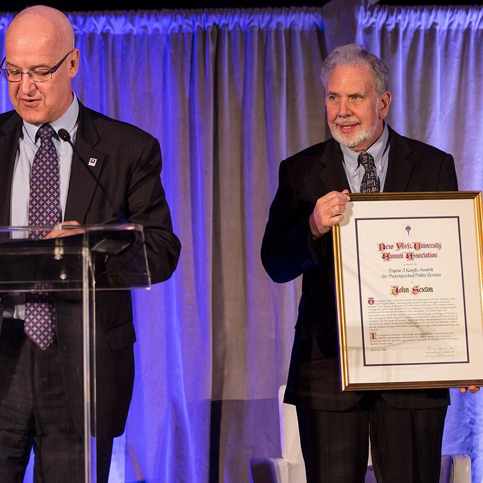 John Sexton accepting award