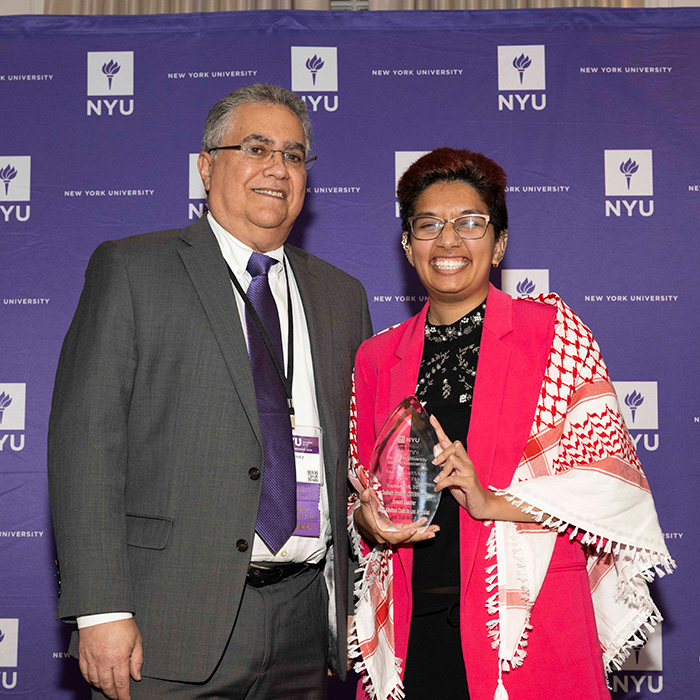 Subah Imami posing with award